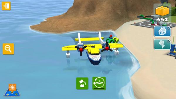 Screenshot: Ein Lego-Wasserflugzeug steht auf dem Strand. 