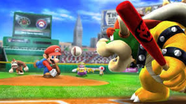 Screenshot: Bowser macht sich bereit den Baseballschläger zu schwingen, Mario wirft den Ball, im Hintergrund ein Baseball-Stadion. 