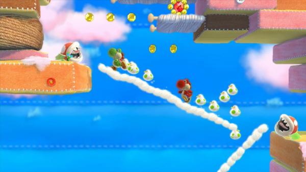 Screenshot: Zwei Yoshis laufen auf einer Wolke