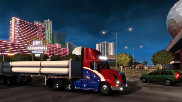 Screenshot: Ein LKW mit aufgemalter US-amerikanischen Fahne steht inmitten von Las Vegas.