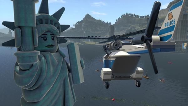 Screenshot: ein Hubschrauber fliegt an einer LEGO-Freiheitsstatue vorbei