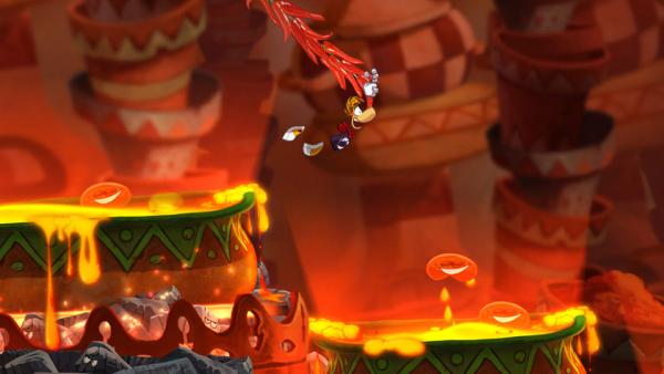 Screenshot: Rayman schwingt an einer Liane