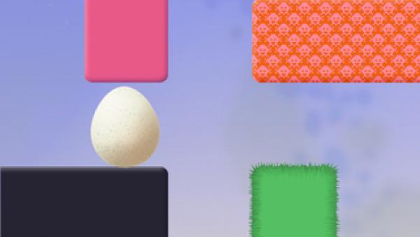 Screenshot: ein Level aus Blöcken, ein weiblicher Charakter und ein Ei